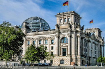 A building with a dome and a flag on top