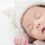 A_newborn_baby_sleeping_peacefully